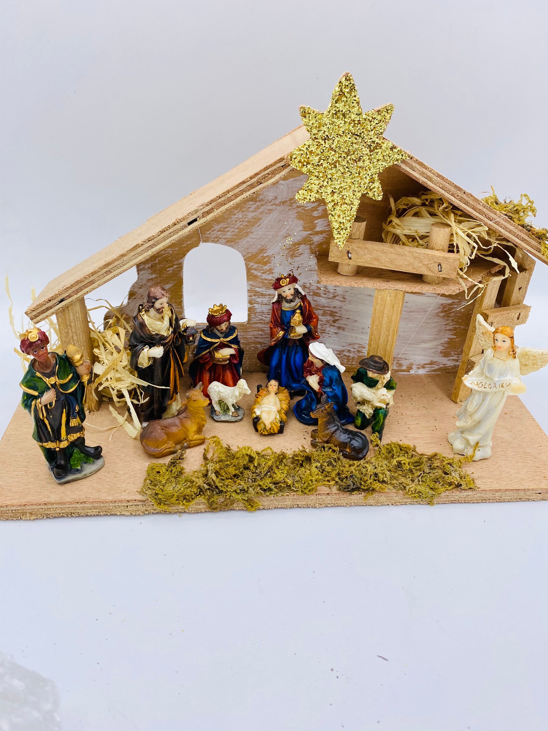 Resin Christmas Nativity Scene: 12-Piece Set with Wood Manger