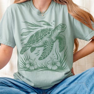 Meeresschildkröte T-Shirt, Ozean-Liebhaber-Geschenk, Linolschnitt Kunst Unisex-T-Stück Strandurlaubs-Resortabnutzung
