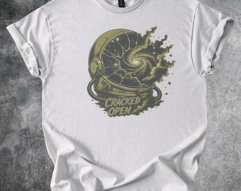 Cracked Open Space Helmet Revealing a Spiral Galaxy Tee