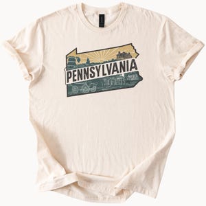 Camiseta con el mapa del estado de Pensilvania, monumentos e iconos históricos. Camiseta con diseño único para los amantes de Pensilvania.