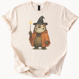 Bear Wizard T Shirt Cute Bear in Witch Hat and Cape with Magic Wand Whimsical Halloween Animal Graphic Tee Gift for Bear Lovers