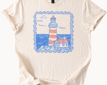 Lighthouse Graphic T Shirt Coastal Ocean Nautical Scene Beach House Illustration Sea Art Unisex Soft Cotton Tee Summer Gift