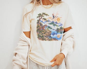 Tiger Resting Above a Mountain Lake with Crane in Flight Tee
