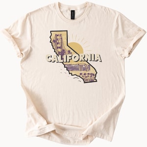 Camiseta gráfica del estado de California con palmeras, puente Golden Gate y puesta de sol. Diseño único del mapa de California. Camiseta gráfica. Camiseta de California.
