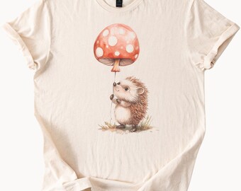 Cute Hedgehog Holding Red Mushroom Balloon Woodland Animal Graphic Nature Forest T Shirt Whimsical Fall Autumn Aesthetic Tee