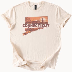 Conneticut State Map Graphic T-Shirt mit Leuchtturm bedeckte Brücke und szenische Wahrzeichen Natur-Shirt Conneticut Souvenir-T-Stück