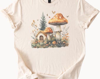 Camiseta con gráfico de hongos cottagecore, casa de bosque caprichosa y mariposas, estética natural, hongos, arte, cuento de hadas del bosque