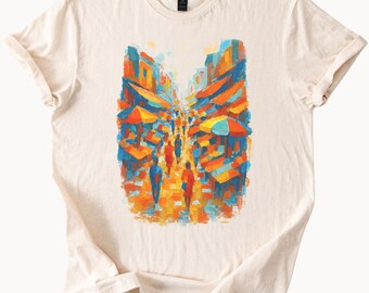 Maglietta con grafica Cityscape Market, scena di strada urbana, design di piazza cittadina colorata, persone che camminano, abbigliamento artistico unico