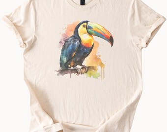 カラフルなオオハシの水彩画グラフィックTシャツ。トロピカルな鳥の自然動物Tシャツ。鳥好きの方へのギフトに、ユニークな芸術的な野生動物アパレルです。