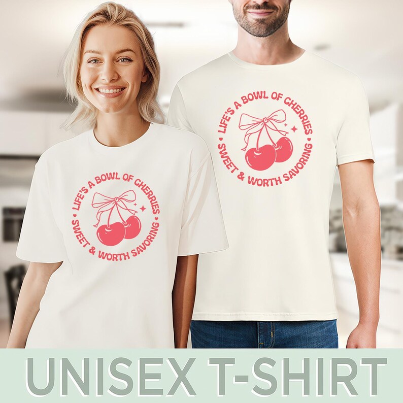 May include: White unisex t-shirt with a pink graphic of two cherries with a bow and the text "LIFE'S A BOWL OF CHERRIES SWEET & WORTH SAVORING".