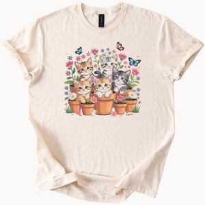 Cute Kittens in Flower Pots Graphic Tee Cat Shirt with Floral Garden and Butterflies Soft Cat Lover Shirt for Spring or Summer