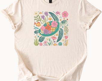 Camiseta con estampado de tortuga marina y flores del océano