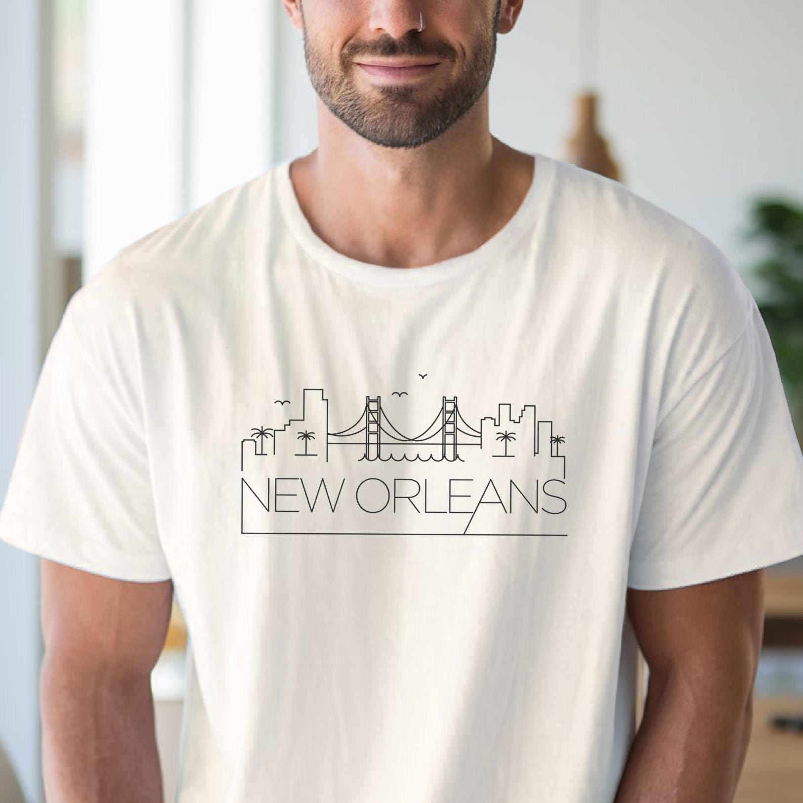 ニューオーリンズのスカイライングラフィックTシャツ、ミニマリストの 