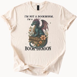 Book Dragon Graphic T Shirt Fantasy Dragon Sitting on Books Reading Lover Shirt Bookworm Gift Literary Tee Flower Art Shirt