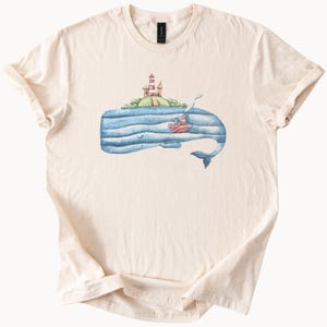 Wal-Leuchtturm-Insel-Grafik-Shirt Ozean-nautische Kunst-T-Stück Wal und Boot Aquarell-Illustrations-Küstennatur-T-Shirt
