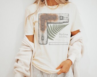 Fern Frond Through Rustic Wood and Iron Tee
