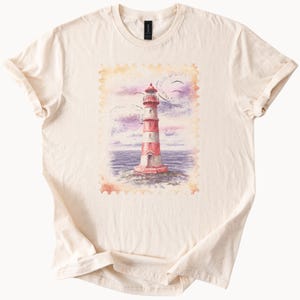 Lighthouse Graphic T Shirt Coastal Ocean Art Tee Nautical Beach Scene Shirt Watercolor Lighthouse Top Summer Sea Gift for Nature Lovers