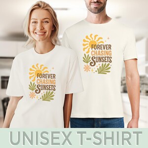 May include: Off-white unisex t-shirts with a retro design. The graphic features a yellow sun, green leaves, and the text "FOREVER CHASING SUNSETS" in brown and orange. The bottom of the image reads "UNISEX T-SHIRT".