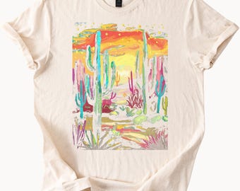 Camiseta gráfica colorida con atardecer de cactus del desierto con paisaje del suroeste pintado a mano y diseño de camiseta con estampado artístico de naturaleza occidental audaz