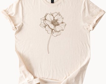 Camiseta minimalista con estampado floral de líneas botánicas, ideal como regalo para amantes de la naturaleza. Camiseta con estampado estético para mujer.