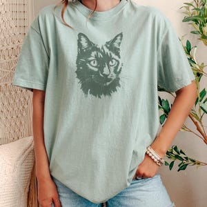 Camiseta unisex con estampado de gato negro, colores cómodos Bay