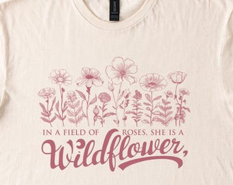 In a Field of Roses She Is a Wildflower Shirt Floral Graphic Tee Nature Inspired Boho Botanical Quote Shirt Gift for Women