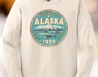 Camiseta gráfica de manga larga de Alaska 1959 con diseño de orca, ballena y montaña, naturaleza escénica, cuello redondo, regalo para amantes de las actividades al aire libre.