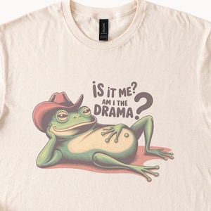 Grappig grafisch T-shirt cowboykikker drama queen is it me am I the drama natuurlijke kleur retro humorontwerp