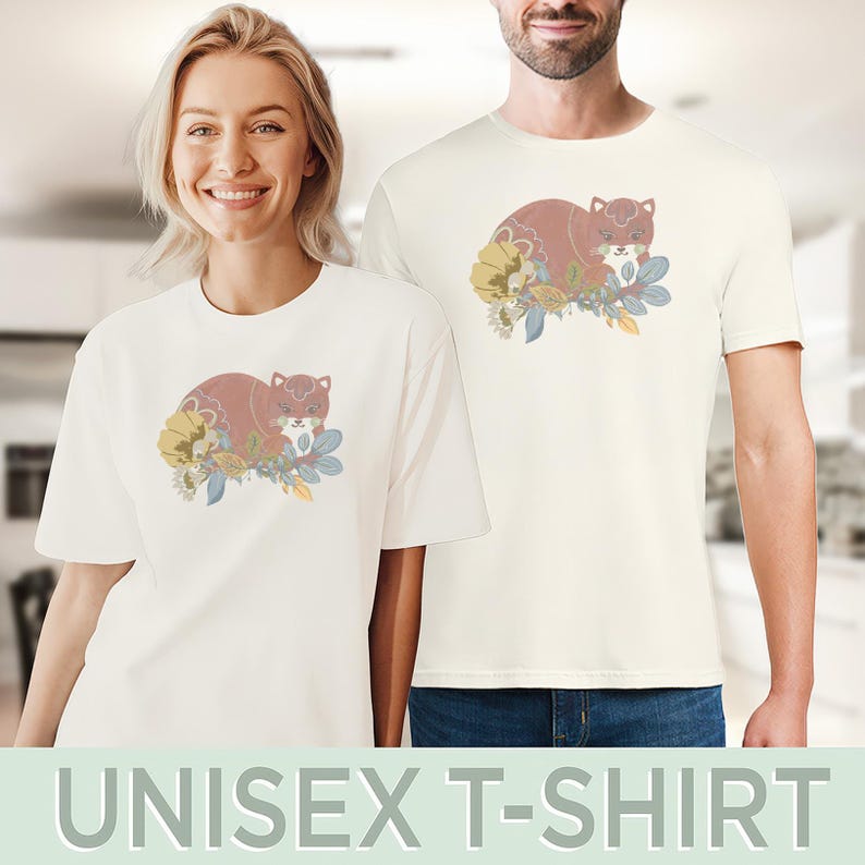 May include: Off-white unisex t-shirts with a cartoon fox design. The fox is brown with a white face, surrounded by yellow, blue, and green flowers. The text "UNISEX T-SHIRT" is at the bottom of the image.