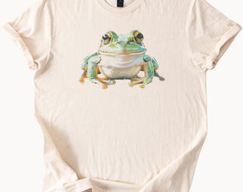Maglietta con grafica colorata e carina di una rana arborea, per amanti degli animali, con estetica anfibia, maglietta unisex con rospo dai toni naturali