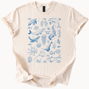 Oceaan dieren grafisch T-shirt zee leven illustratie T-shirt met walvishaai dolfijn octopus schildpad kwal zeedieren kunst