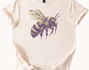 Maglietta grafica con ape e miele, maglietta per amanti della natura con insetto realistico, stampa botanica con ape, maglietta color crema naturale, regalo per gli appassionati di api