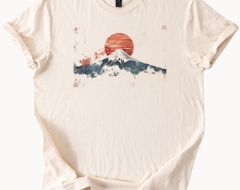 Japanese mountain sunrise graphic nature art t shirt with red sun and watercolor Mount Fuji design minimalist outdoors Japan scene tee