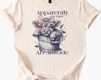 Highland cow shirt cute cow in bucket with pink bow and flowers apparently I have an attitude funny animal graphic tee for women