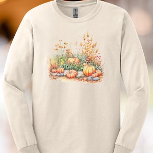 Camisa de manga comprida com estampa de abóboras e flores de outono, camiseta gráfica aconchegante com tema botânico de Ação de Graças
