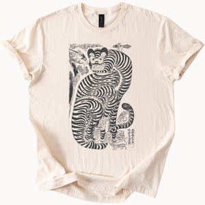 花柄グラフィックTシャツ、カラフルな花柄シャツ、ボタニカルプリント