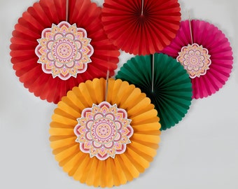 May include: A collection of colorful paper fan decorations in red, yellow, green, and pink. Each fan features a decorative mandala design in the center. These festive decorations are perfect for parties and celebrations.