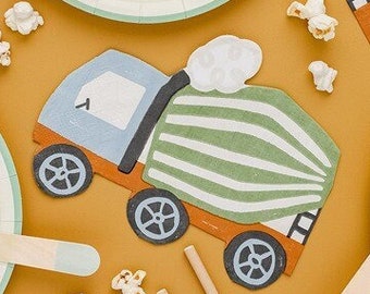 May include: Construction themed paper plates and napkins with a yellow and orange donut on a yellow background. The plates feature a repeating pattern of cement trucks and construction cones. The napkins feature a single cement truck design.