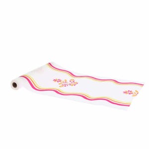 May include: A roll of white paper featuring a repeating floral pattern and wavy pink and yellow stripes. The paper is unrolled, displaying the design. The floral pattern is in shades of yellow and orange.