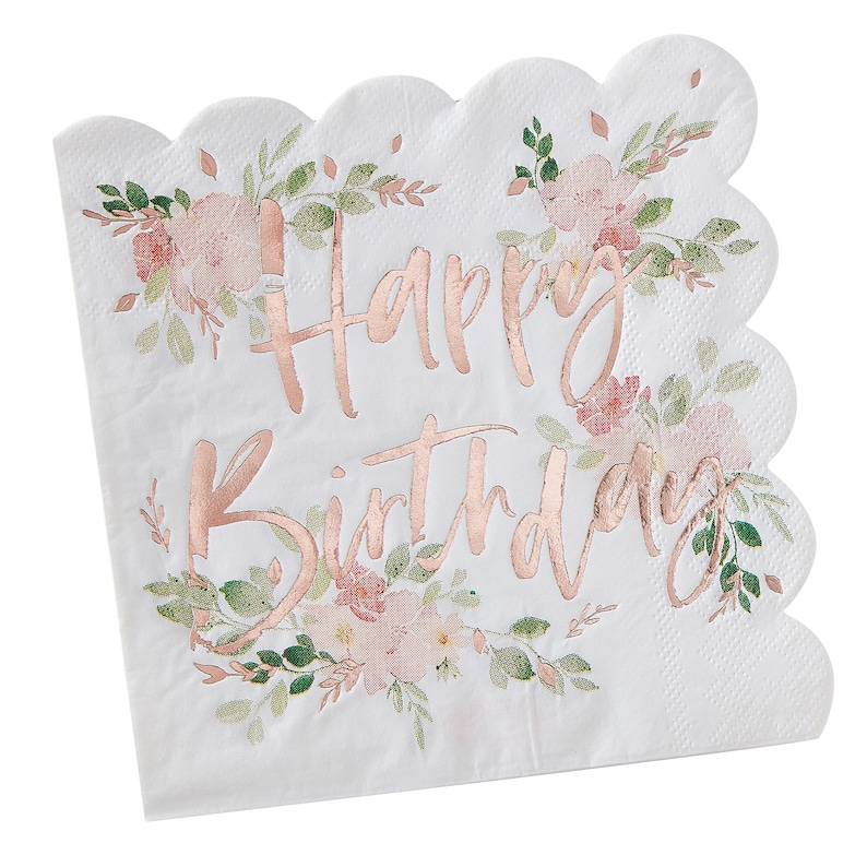 May include: White scalloped-edge paper napkin with the words "Happy Birthday" in rose gold script. The napkin is decorated with watercolor-style pink flowers and green leaves, creating a floral design.