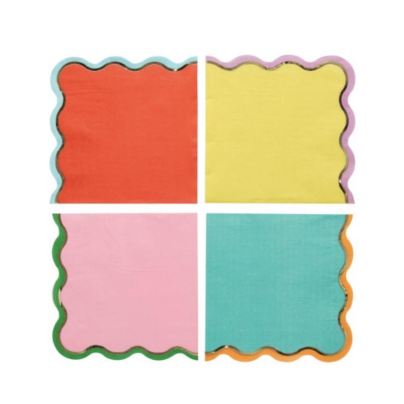 May include: Set of four scalloped paper napkins with gold foil trim. The napkins are in the colors orange, yellow, pink, and teal.