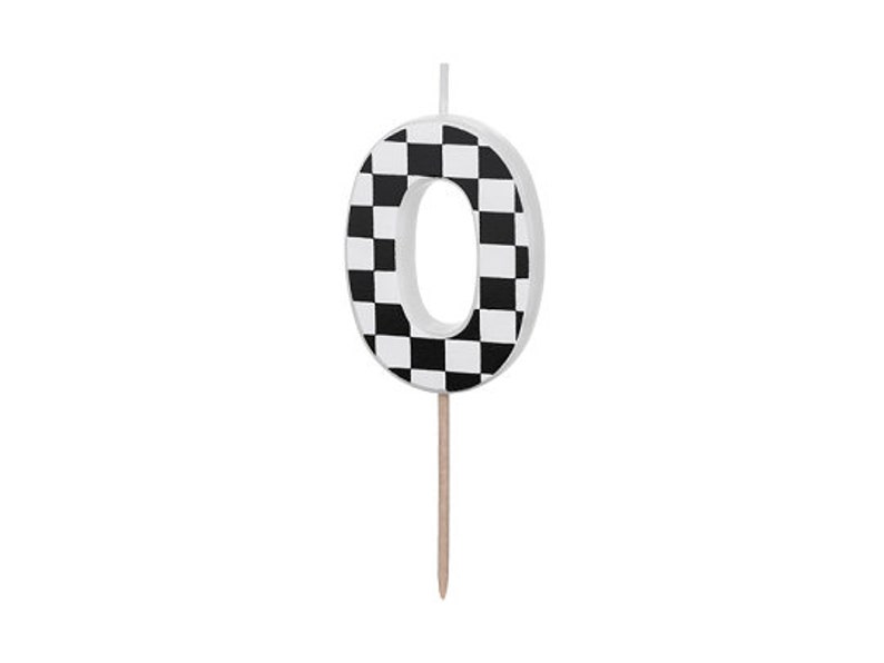 May include: Black and white checkered number zero birthday candle. The candle is on a stick.