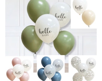 May include: A set of balloons in various colors, including white, green, blue, and pink. Each balloon has the text "hello baby" printed on it.