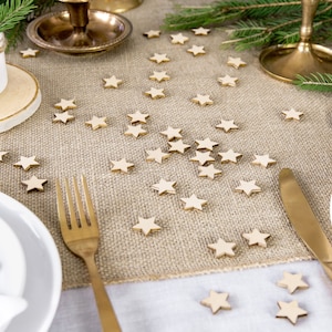Houten sterrenconfetti - verpakking van 50 stuks - houten tafeldecoratie - kersttafelconfetti - sterrenconfetti - houten sterrenconfetti