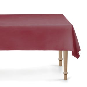 May include: A rectangular burgundy tablecloth draped over a wooden table. The tablecloth covers the entire table surface, with a portion of the fabric hanging over the edge. The table has four wooden legs.