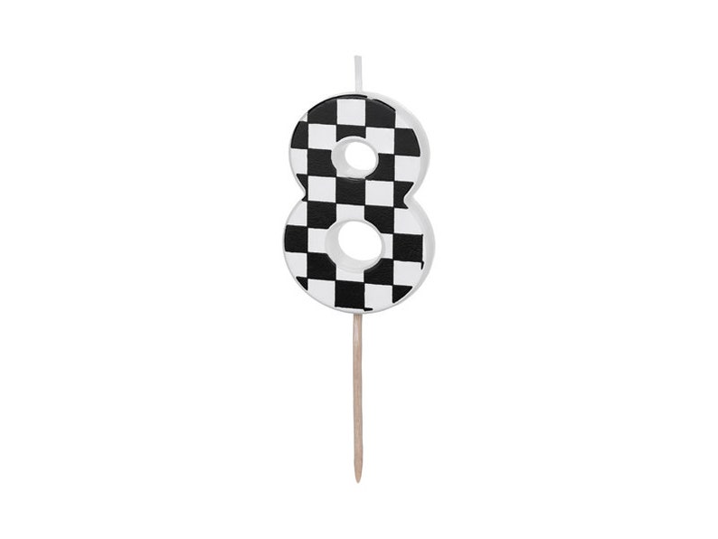 May include: Black and white checkered number eight birthday candle. The candle is on a wooden stick.