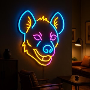 May include: A neon sign in the shape of a hyena's head, with a blue outline for the ears, a yellow outline for the face, and pink accents for the eyes and mouth. The sign is mounted on a dark gray wall.