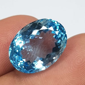 Paar natuurlijke Zwitserse blauwe topaas: 16 x 12 mm ovaal geslepen oorbellen