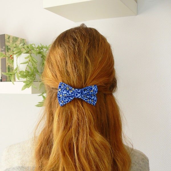 Pince à cheveux nœud-papillon imprimé bleu et doré