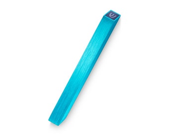 May include: A long, thin, turquoise blue object with a small, square, dark blue button on the top. The object has a textured surface.